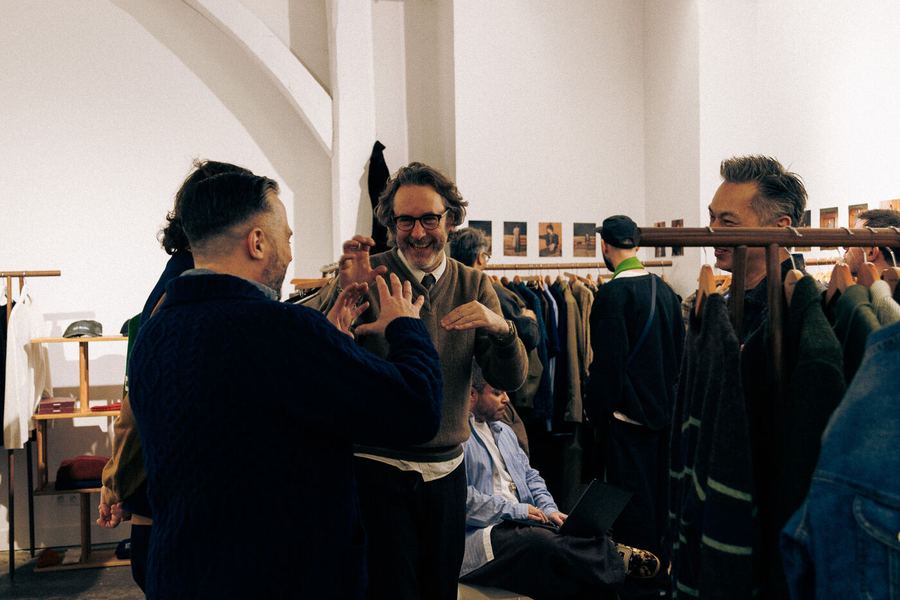 Buyers and brands talking across the showroom.